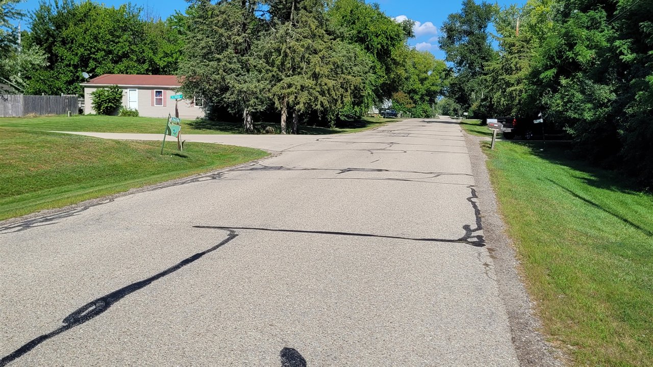 Bohner Drive's cracked and failing rural pavement before rehabilitation