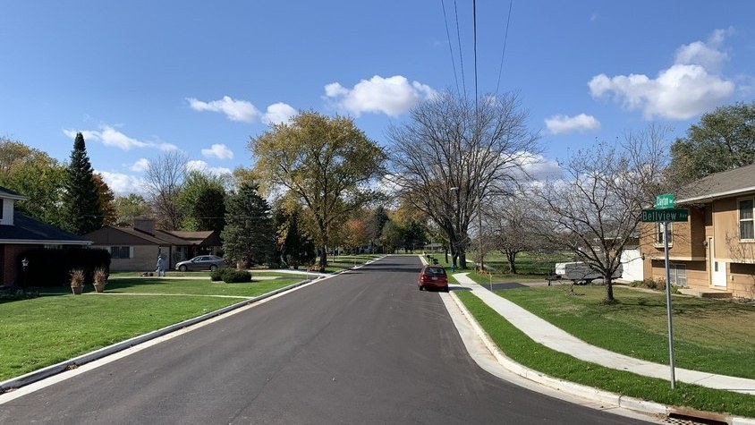 Urbanized Clayton Avenue with new curb, gutter, and sidewalk in East Troy