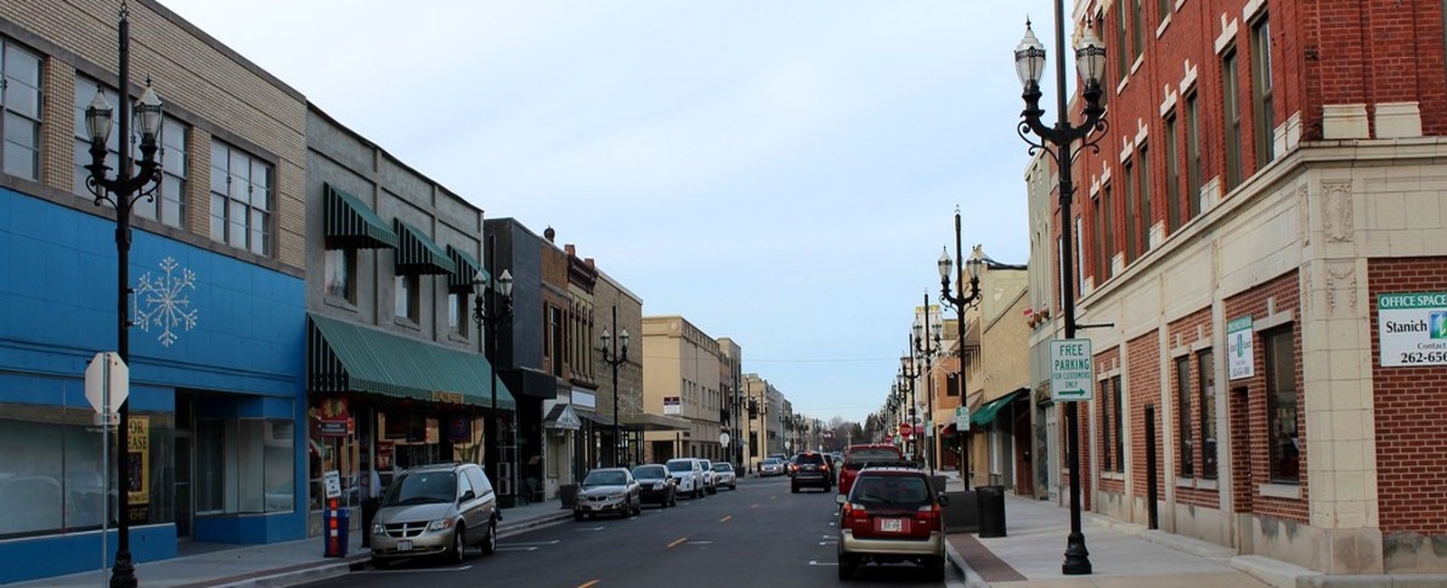 Revitalized 6th Avenue streetscape with historic lighting in downtown Kenosha