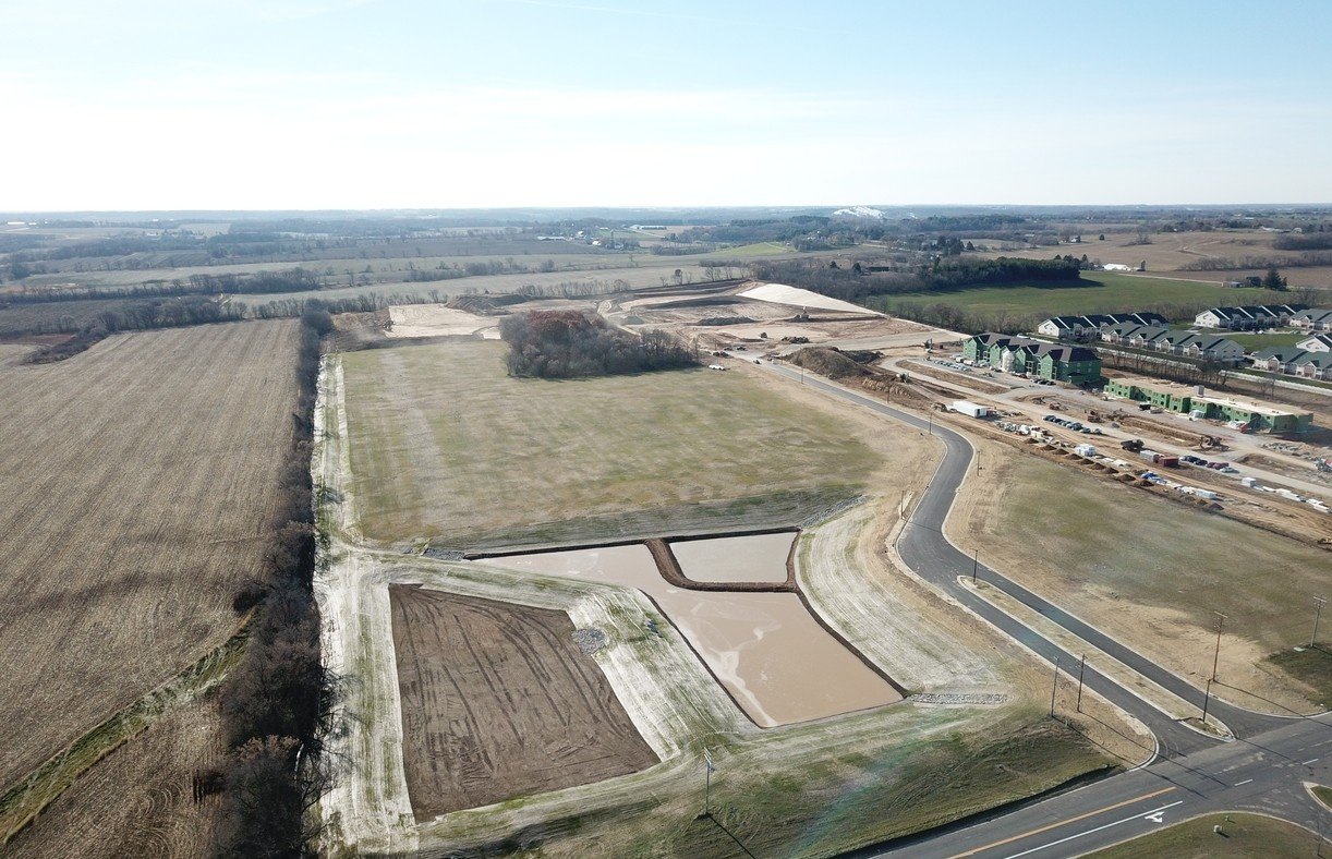 Drone view of South Executive Drive improvements and graded development lots