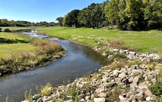 Riffles and rock features oxygenating the restored stream