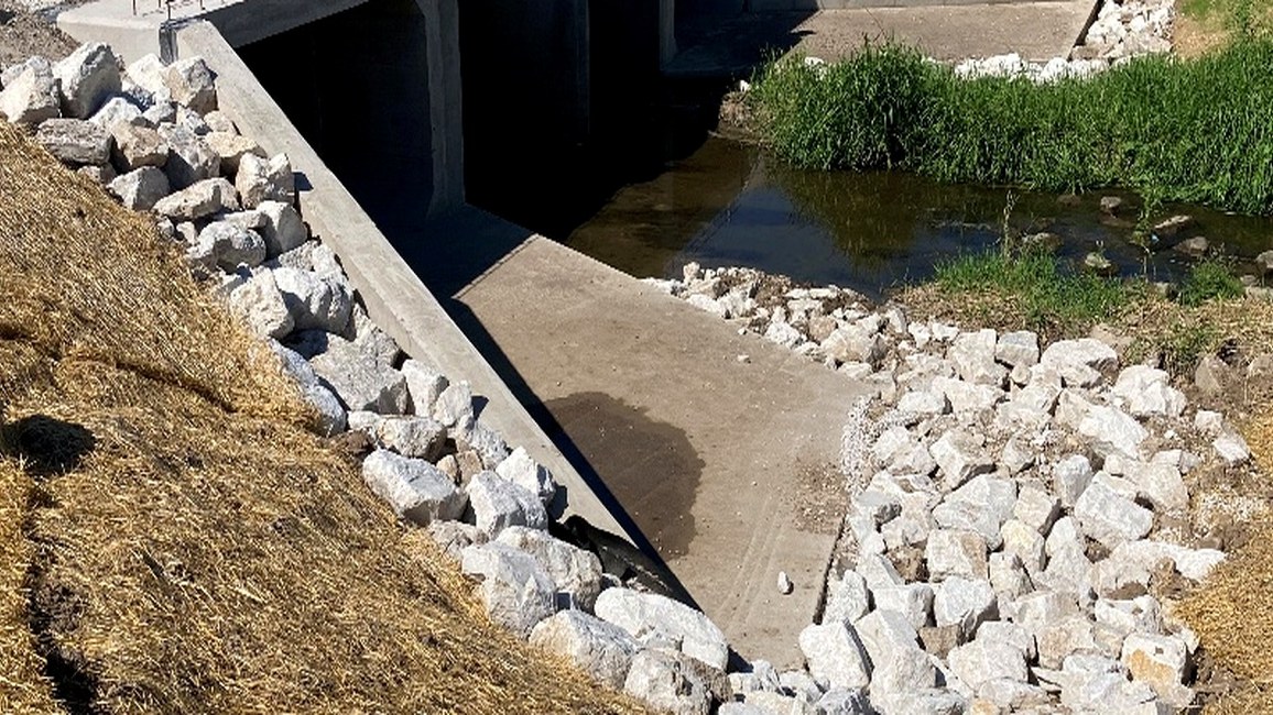 Expanded Stanley Drive box culvert with new barrels, aprons, and riprap